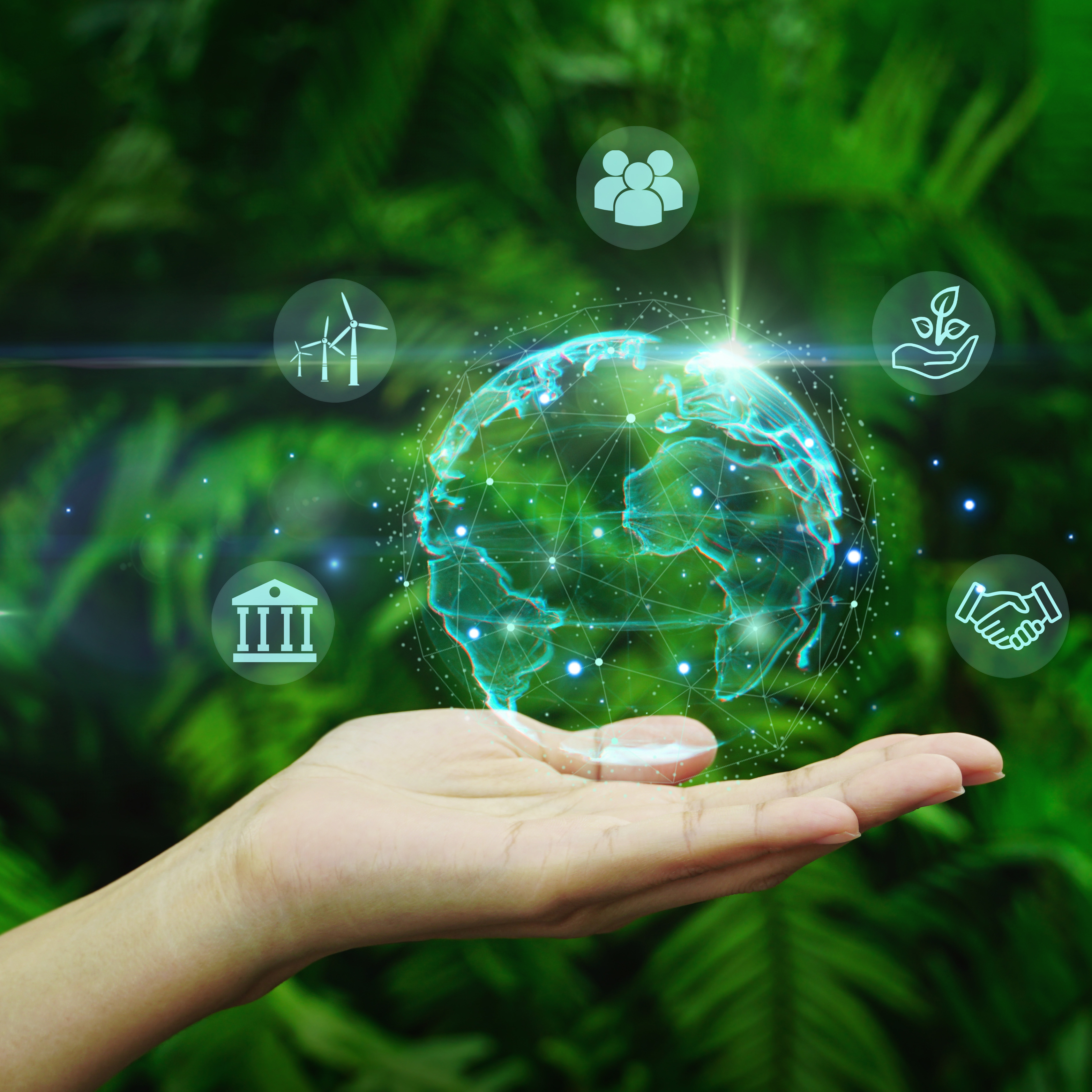 Hand mit transparenter Weltkugel